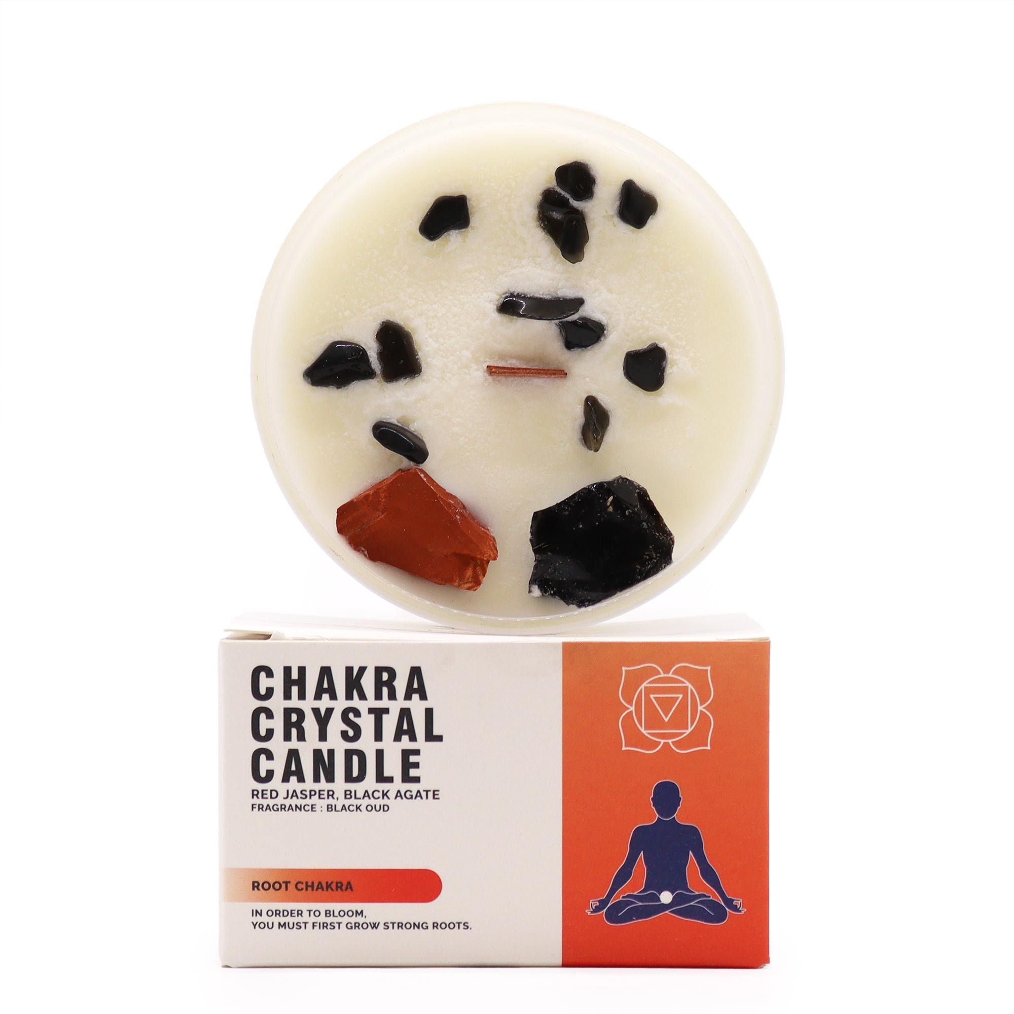 Chakra crystal candle with packaging on a white background