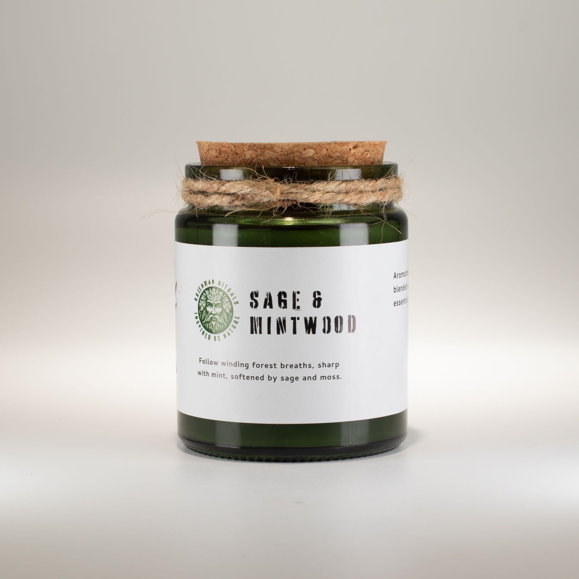 A scented candle jar labeled &