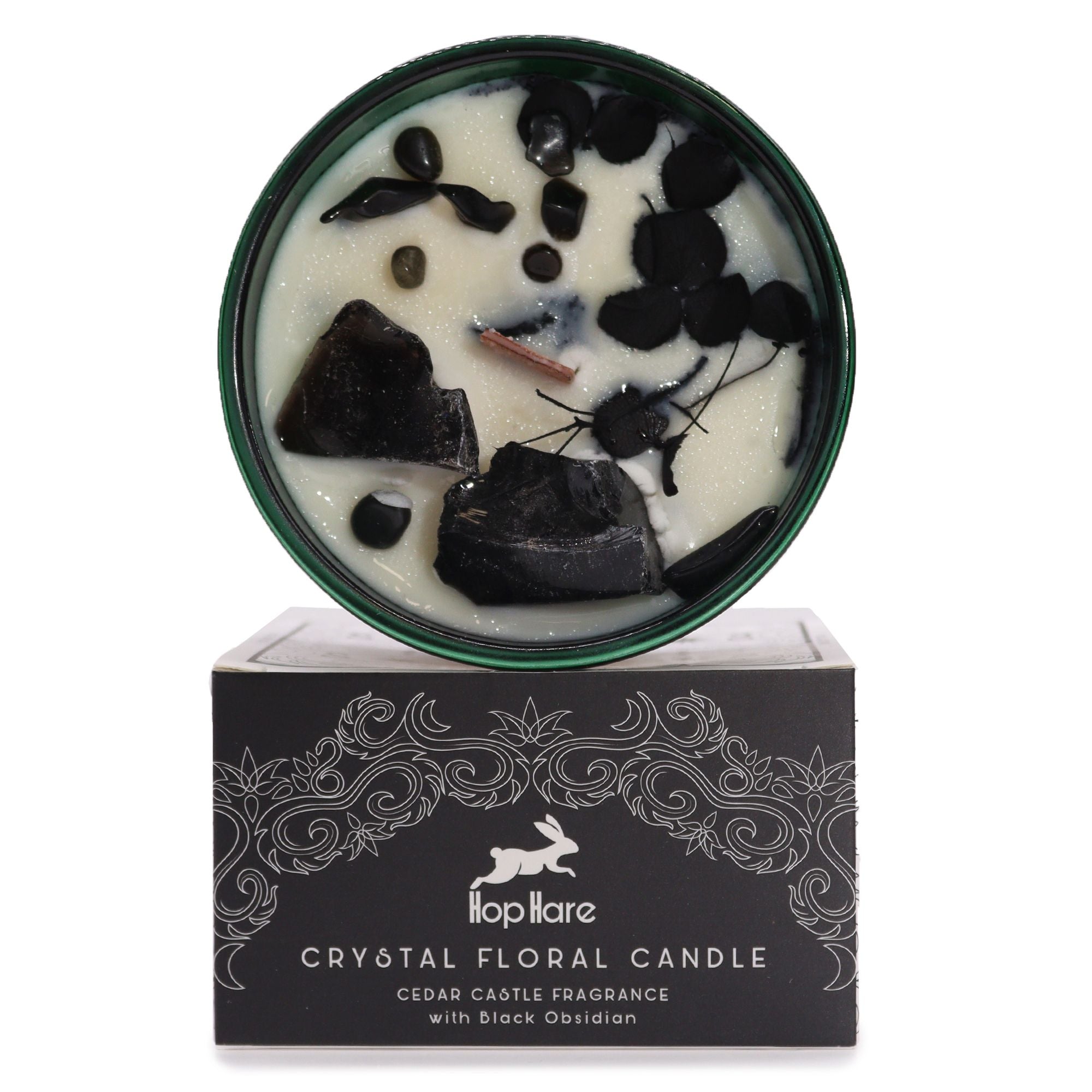 Crystal floral candle with black obsidian on a white background, featuring the brand &