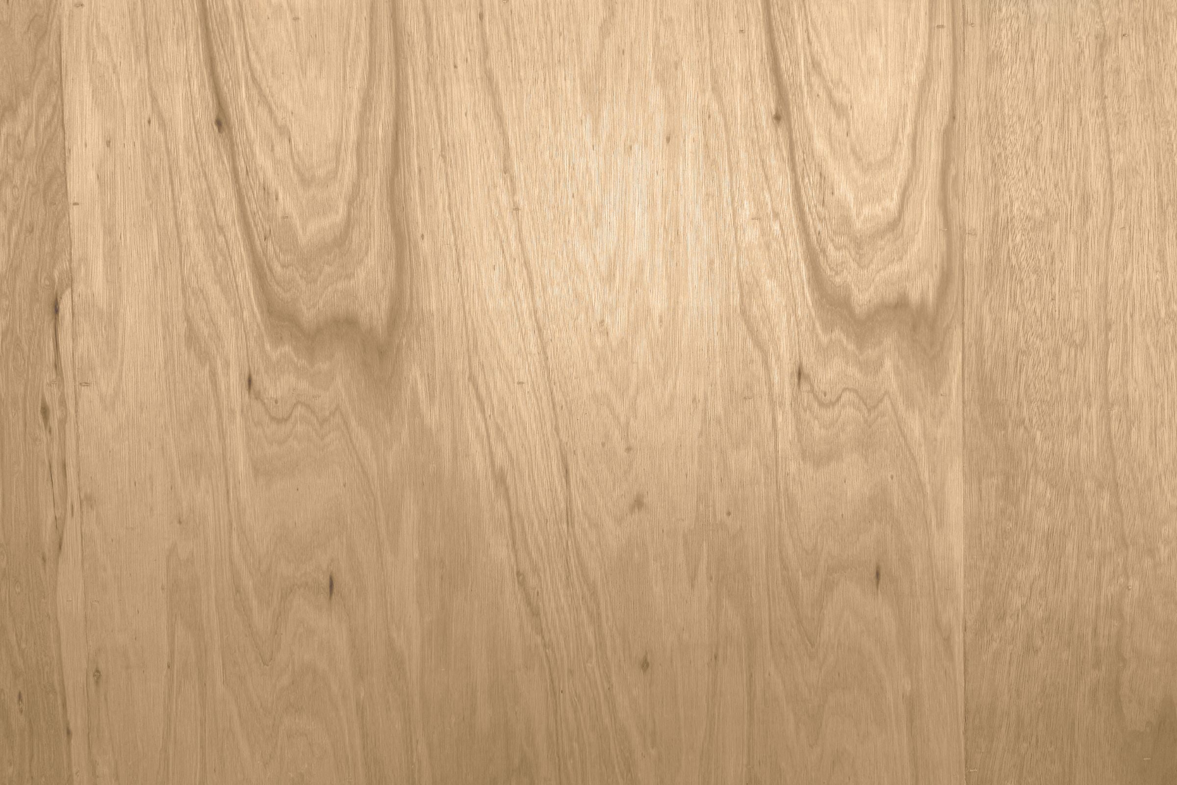 Close-up of a wooden surface with visible grain and texture