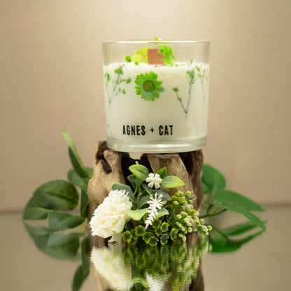 Candle with floral design and &