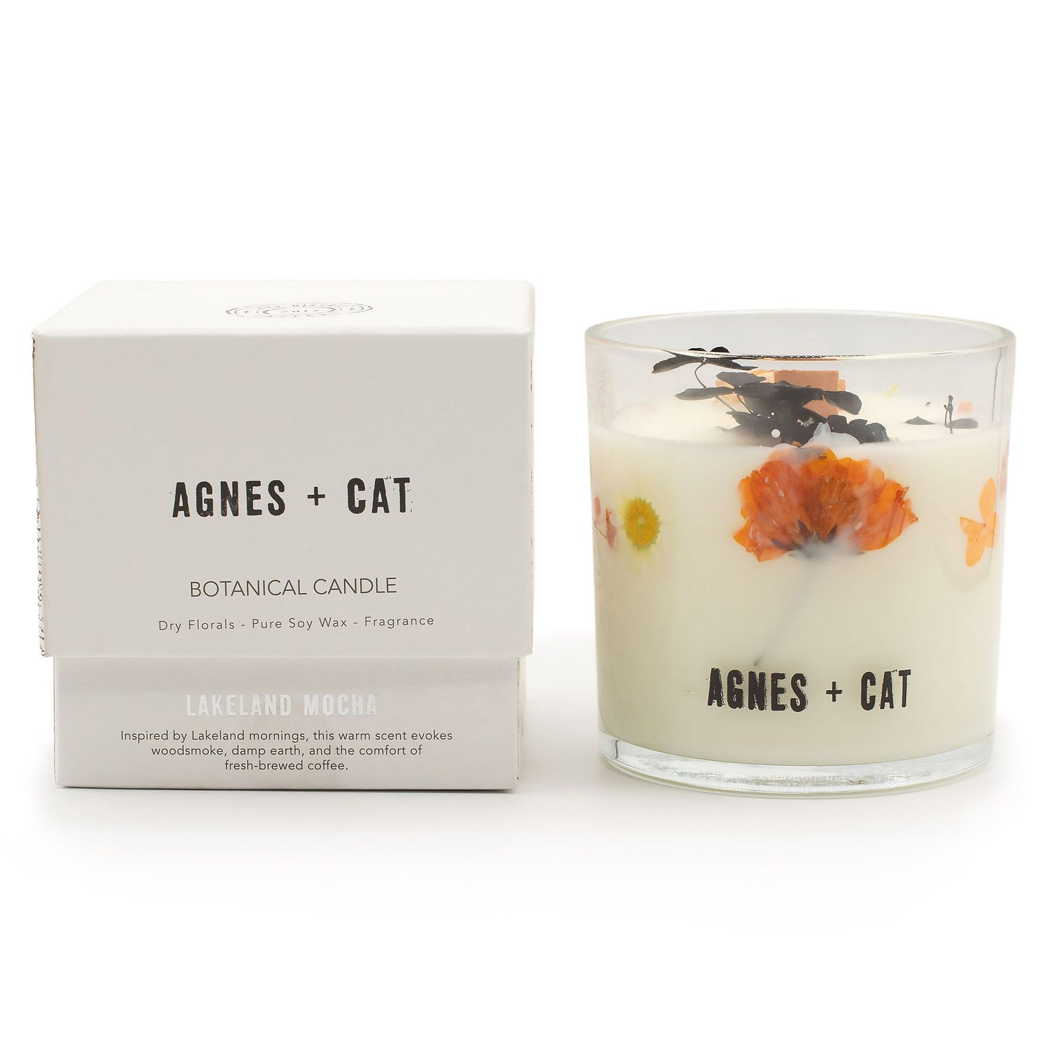 Agnes + Cat botanical candle with packaging on a white background