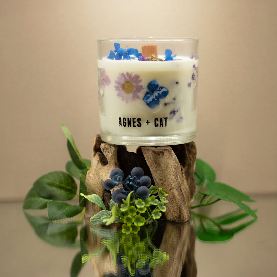 Candle with floral design and &