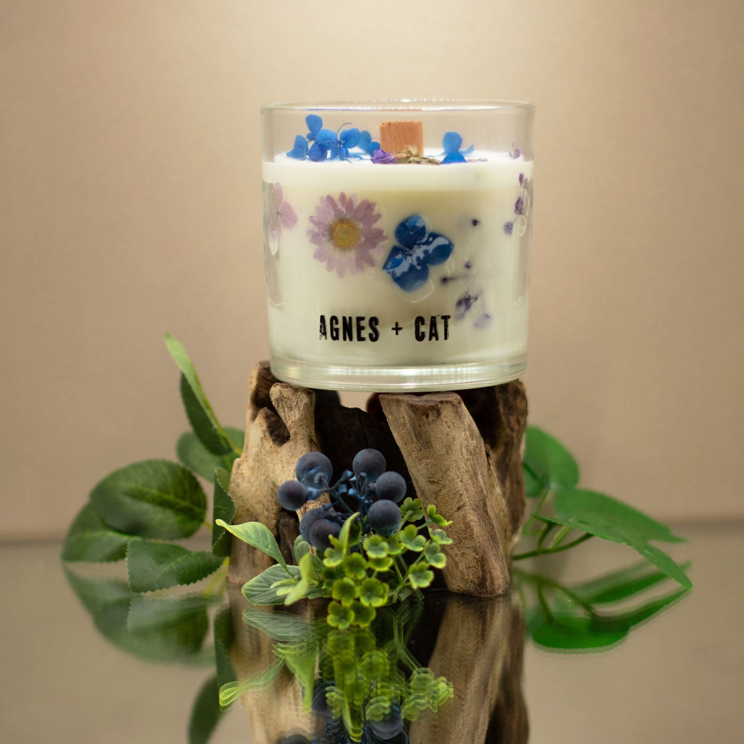 Candle with floral design and &