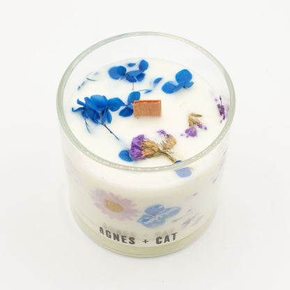 Candle with floral design and &