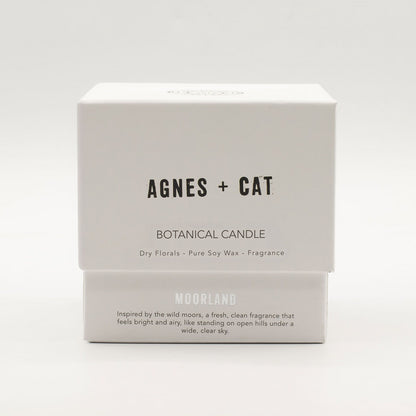 Boxed botanical candle by Agnes + Cat on a white background
