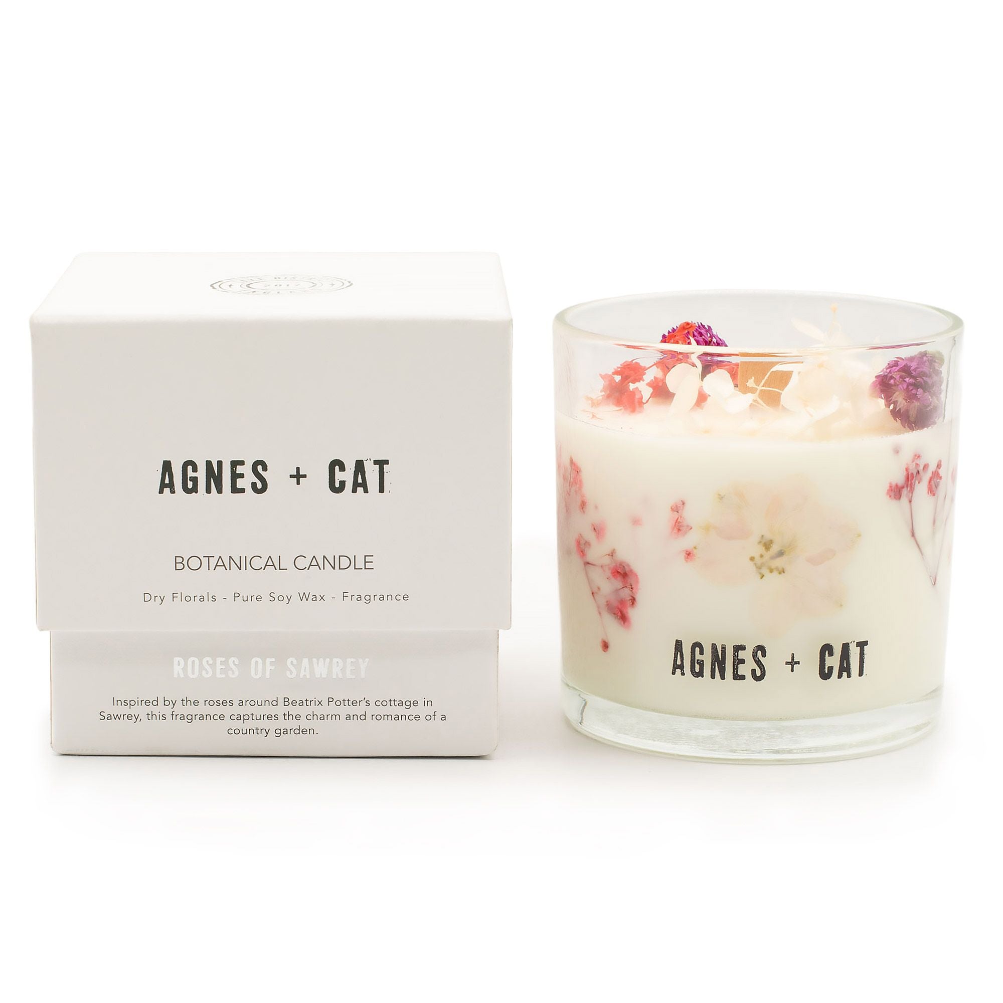 Floral candle with packaging labeled &