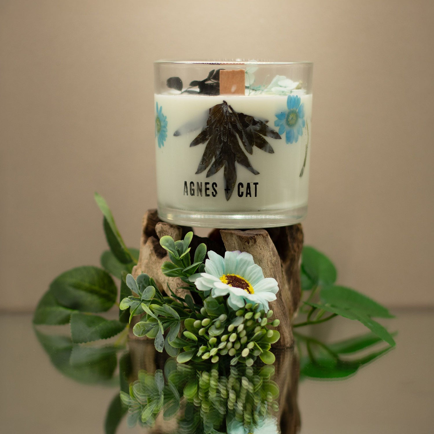 Candle with floral design and &