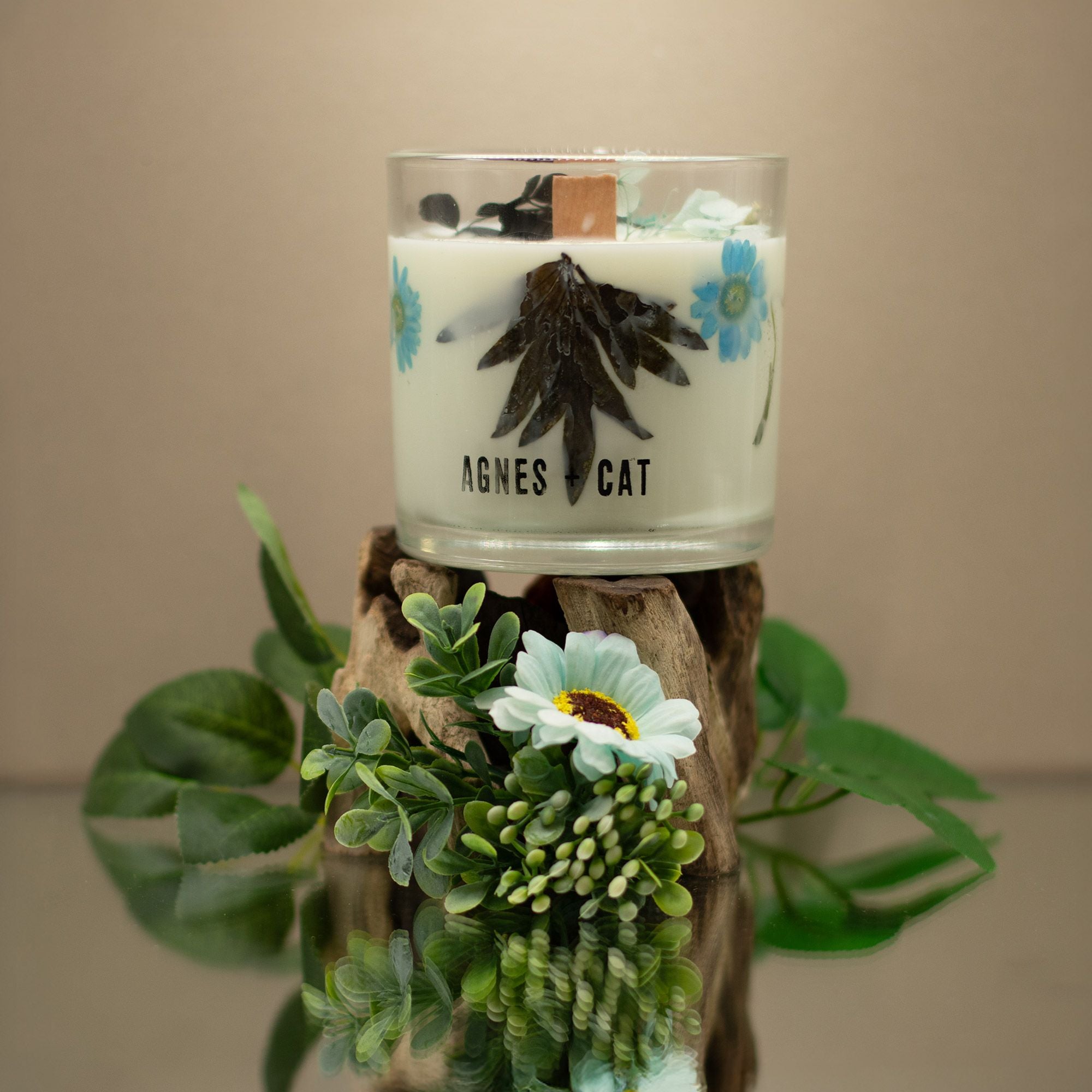 Candle with floral design and &