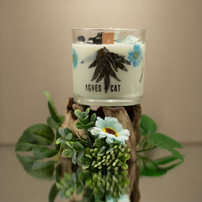 Candle with floral design and &
