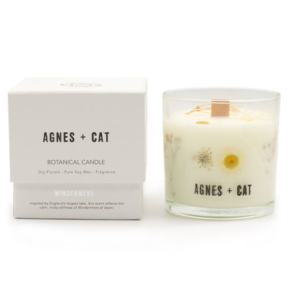 Agnes + Cat botanical candle with packaging on a white background
