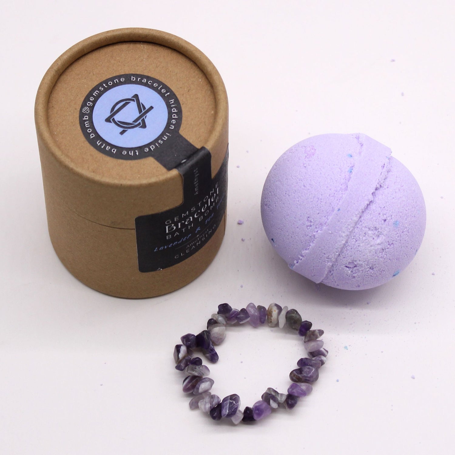 Bath bomb and bracelet with packaging on a white background