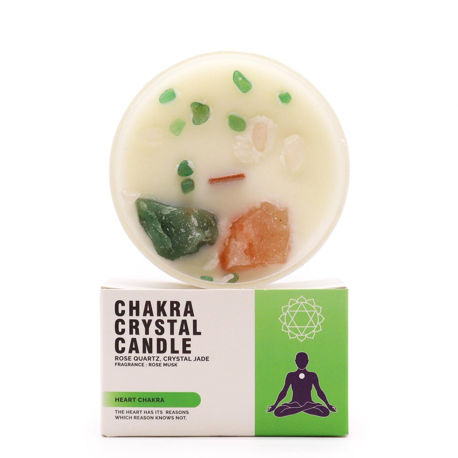 Chakra crystal candle with visible stones on a white background