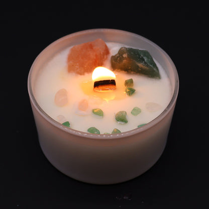 Candle with decorative elements on a black background