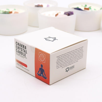 Box of Chakra Crystal Candle with candles in the background