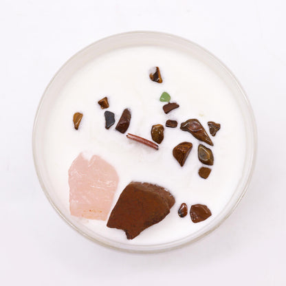 Glass dish with decorative stones on a white background