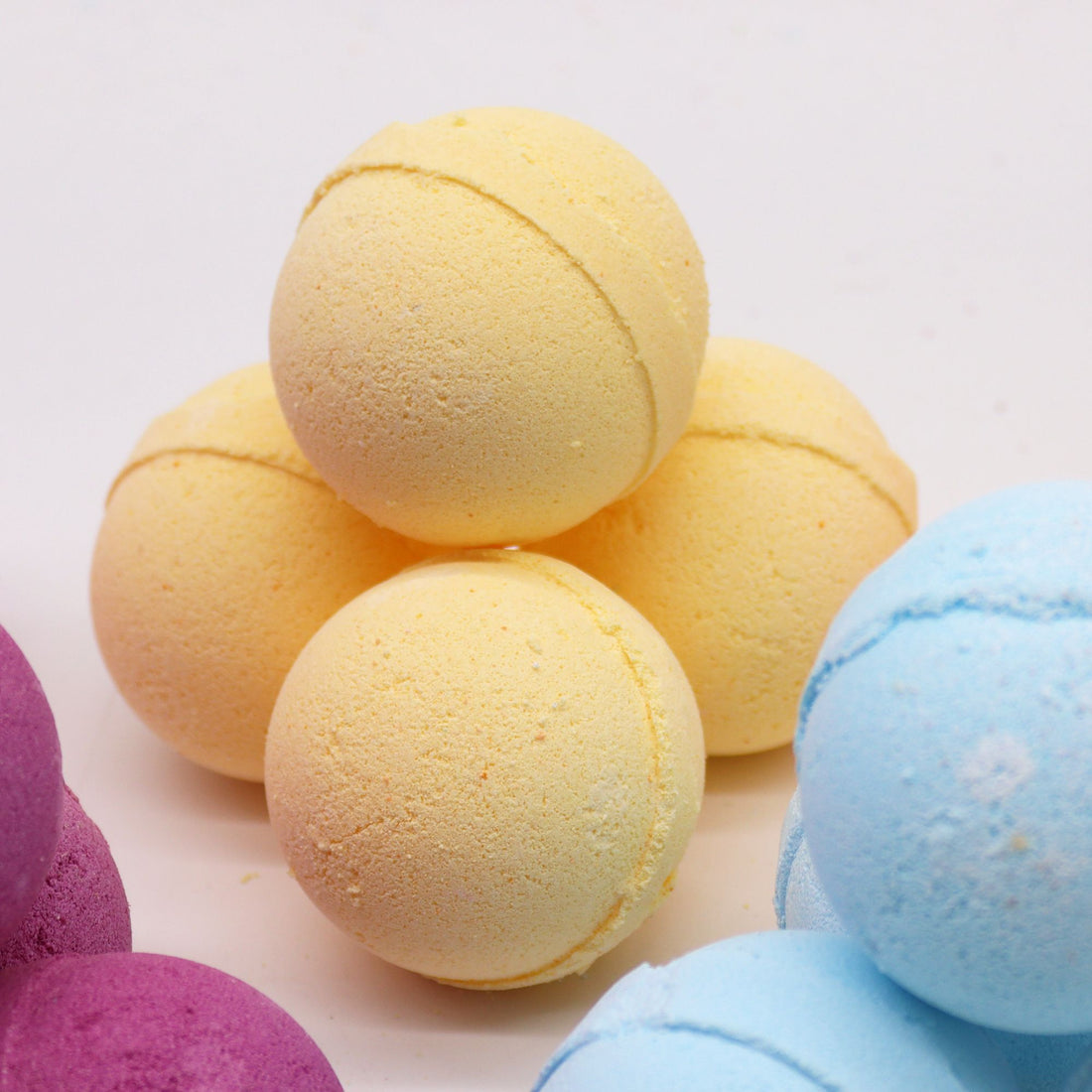 Colorful bath bombs on a light background