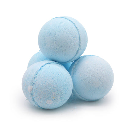 A stack of light blue bath bombs on a white background