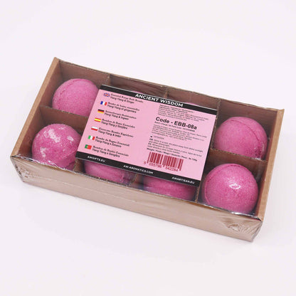 Box of pink bath bombs with a label on a white background