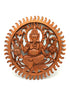 Wooden wall art depicting a seated figure with intricate carvings on a white background