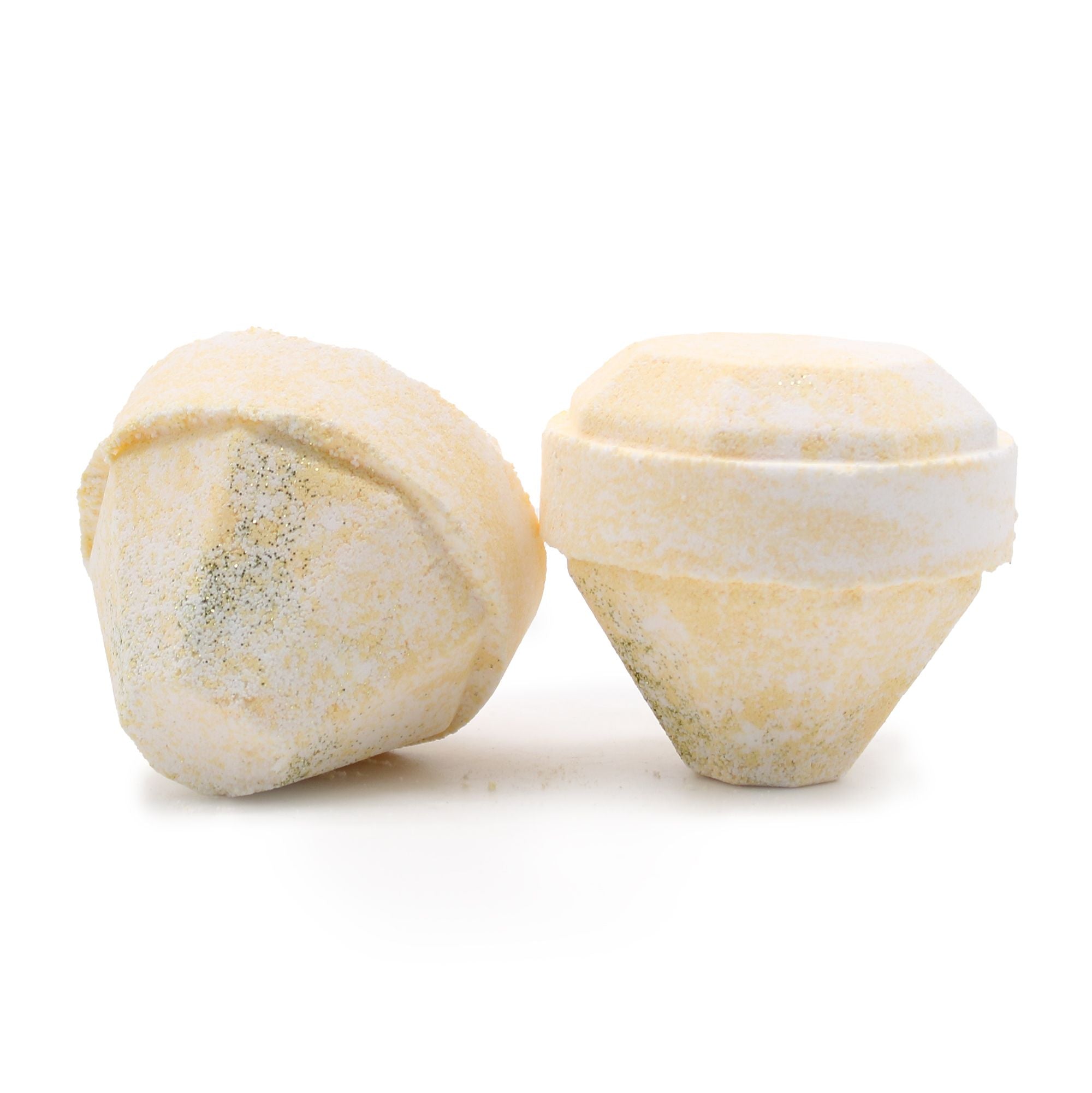 Two marbled bath bombs on a white background