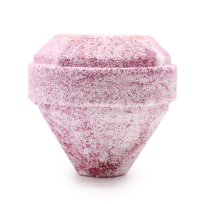 Speckled pink and white gemstone bath bomb on a white background