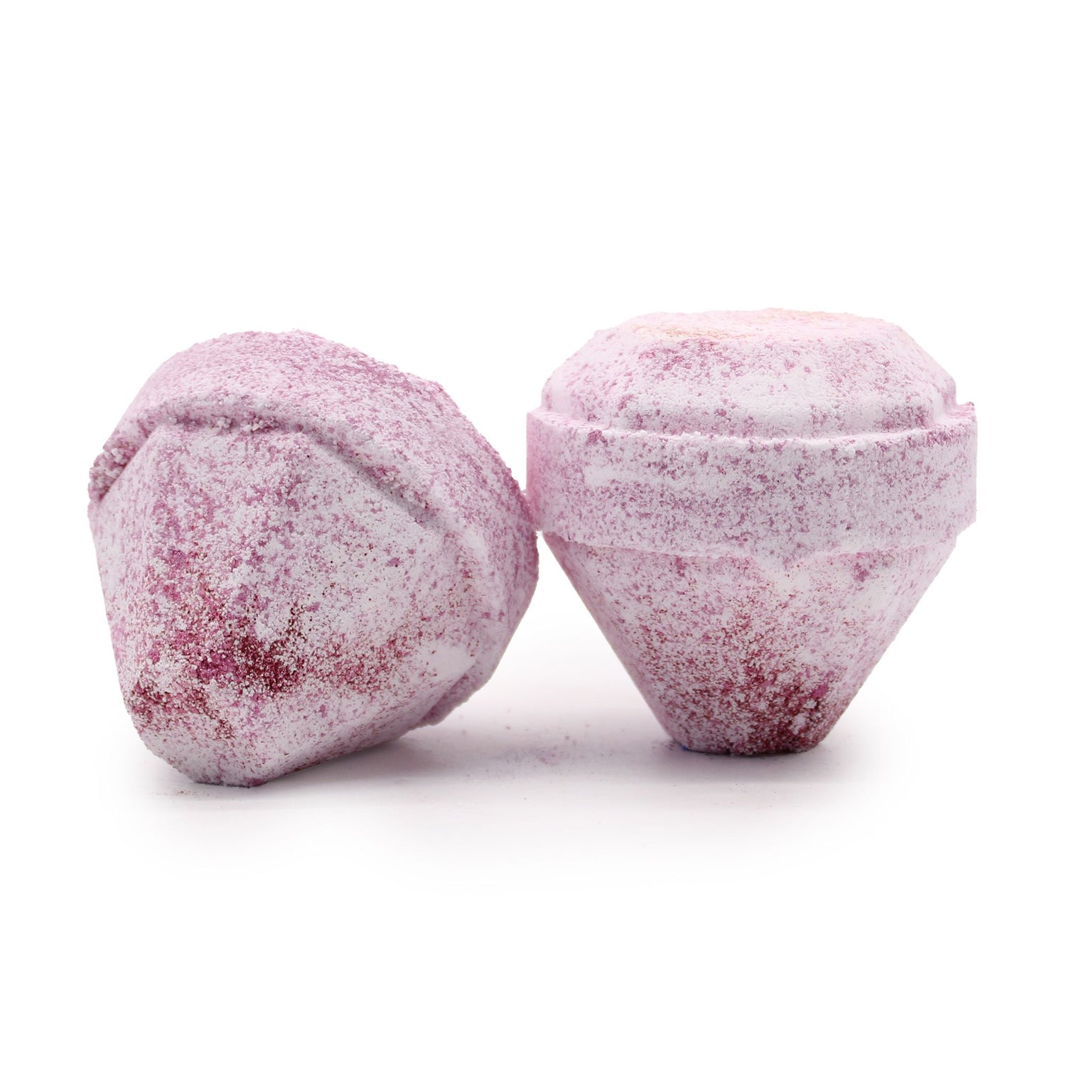 Two pink bath bombs with a textured surface on a white background