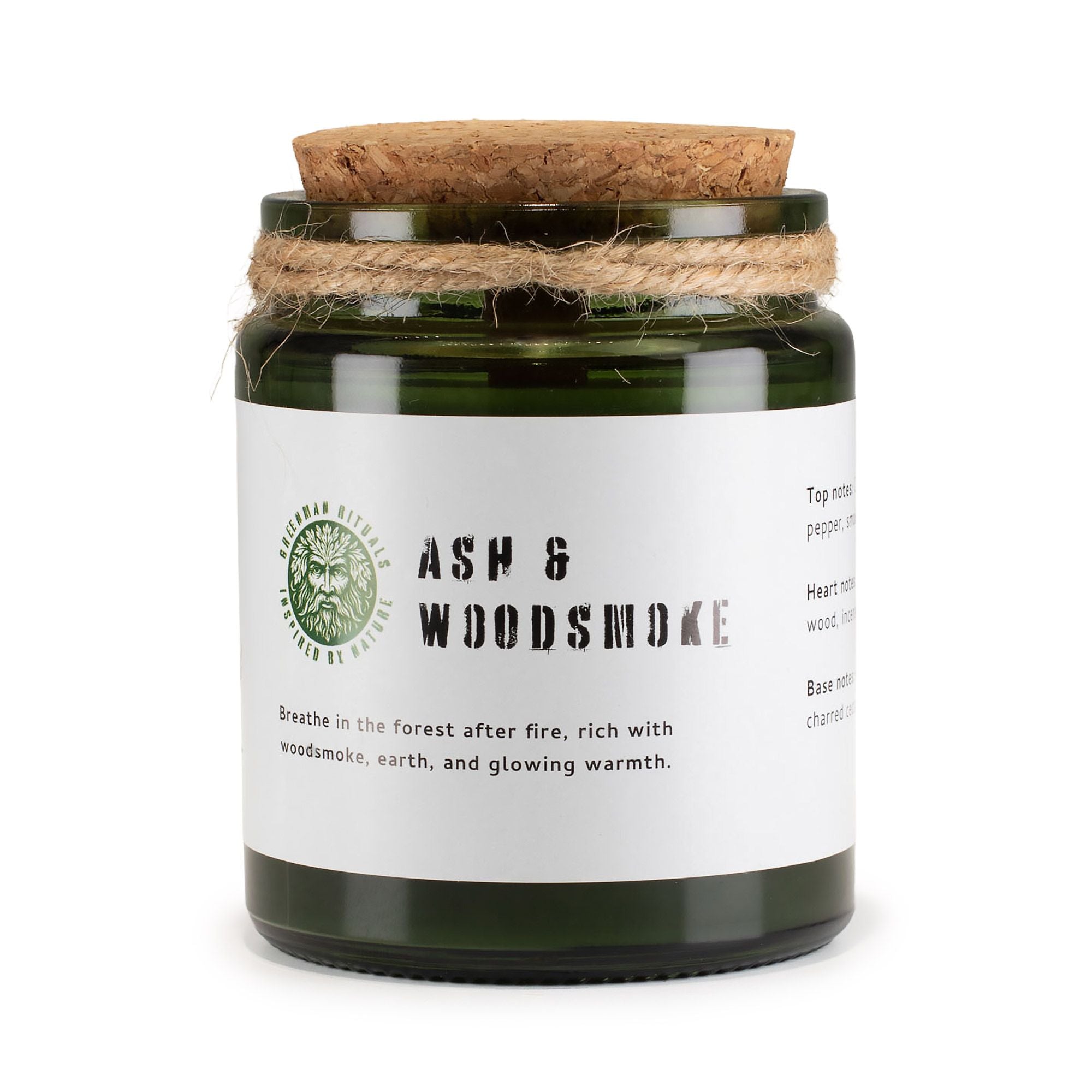 Candle jar with cork lid and white label on a white background