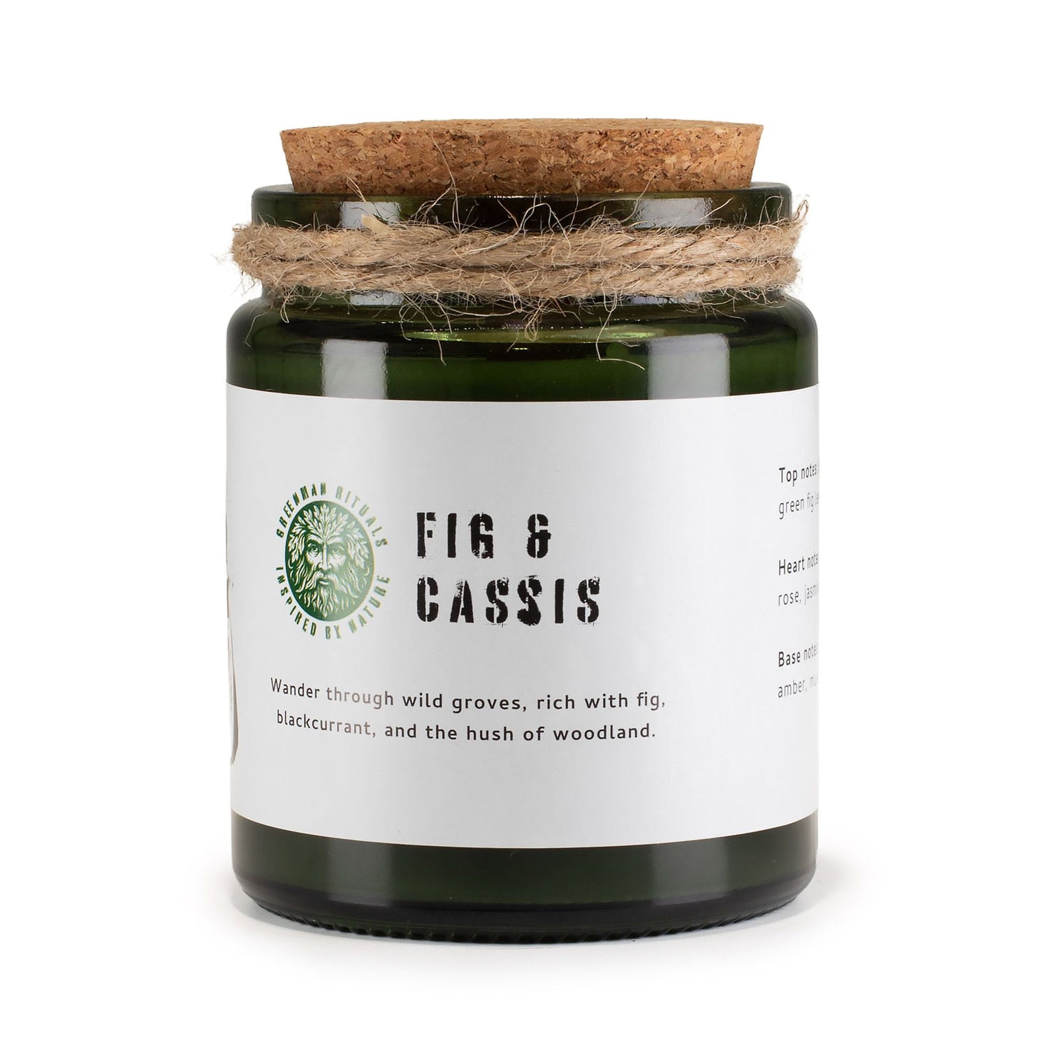 Candle jar with cork lid and white label on a white background