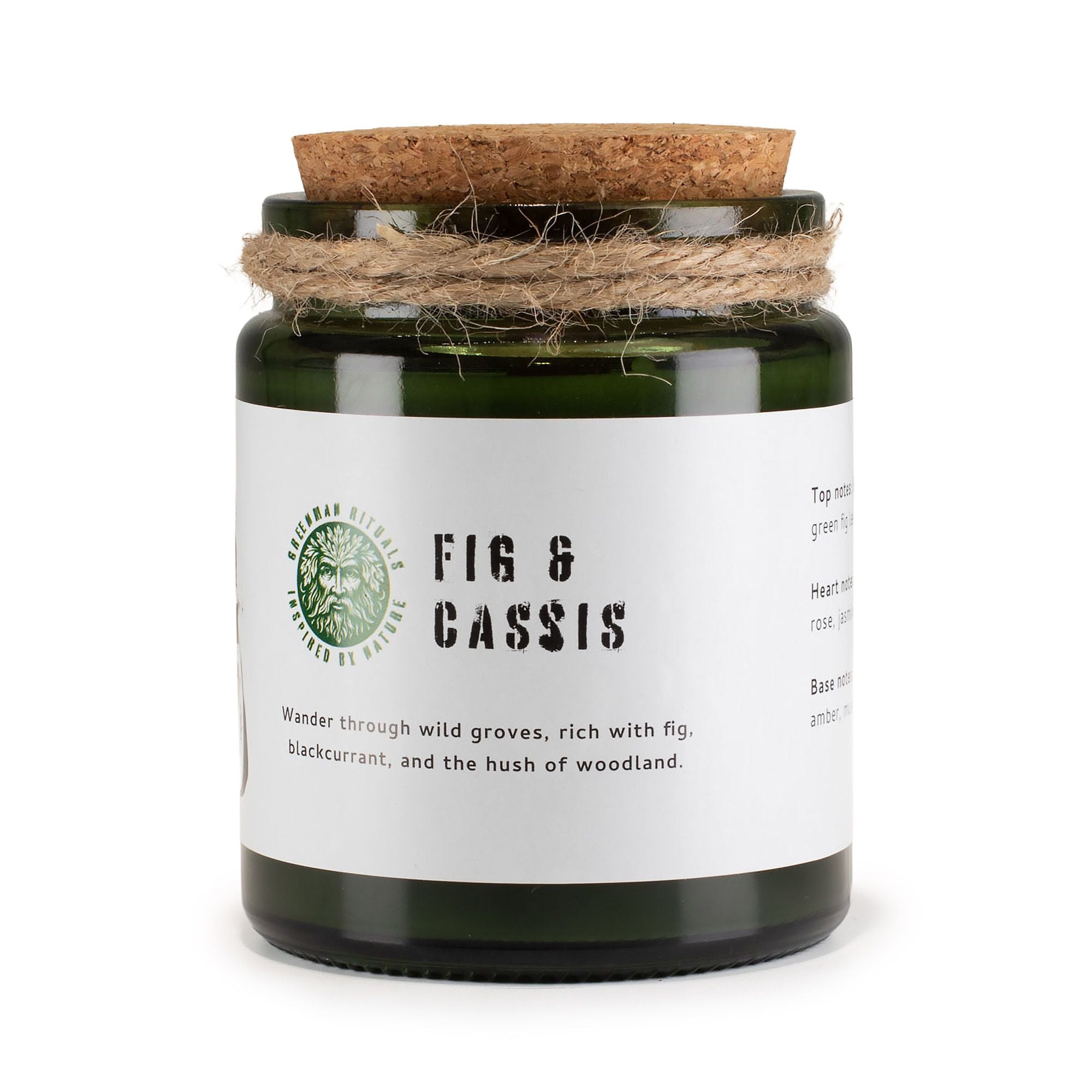 Candle jar with cork lid and white label on a white background
