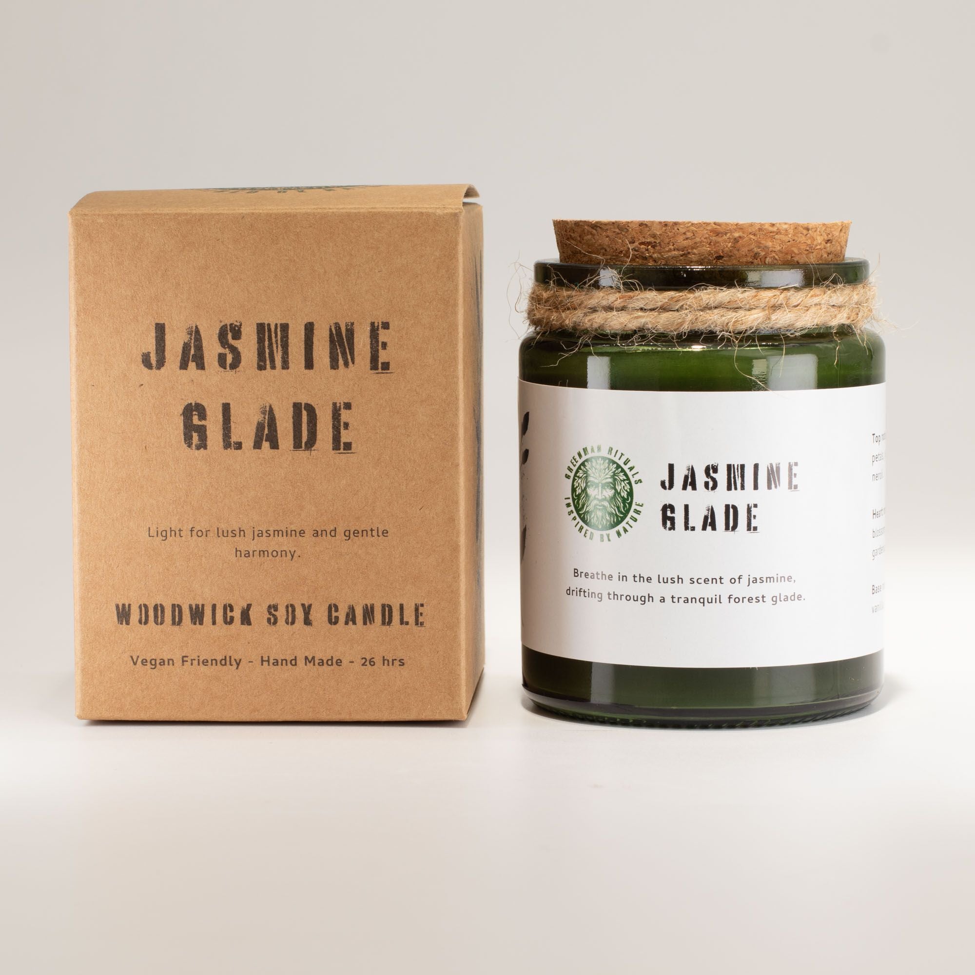 A wooden wick Jasmine Glade candle and packaging on a white background