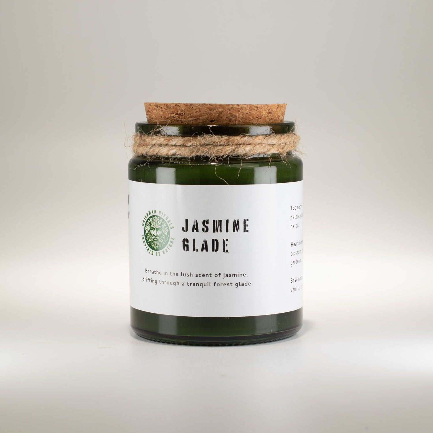 Candle with a label reading &