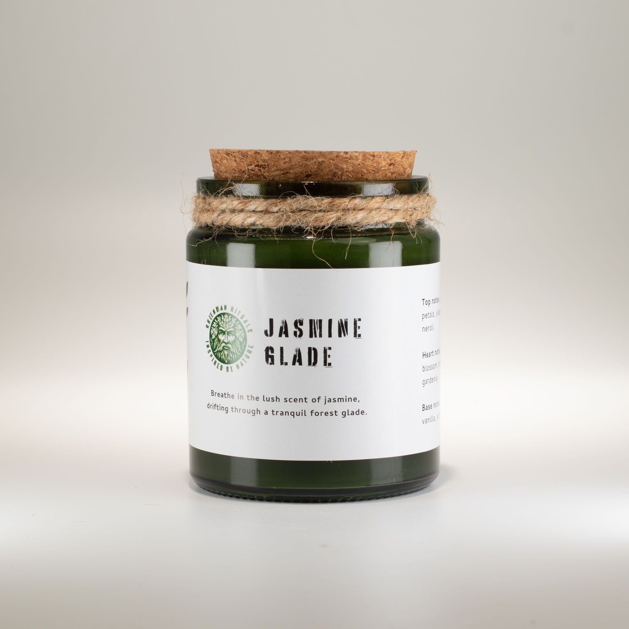 Candle with a label reading &