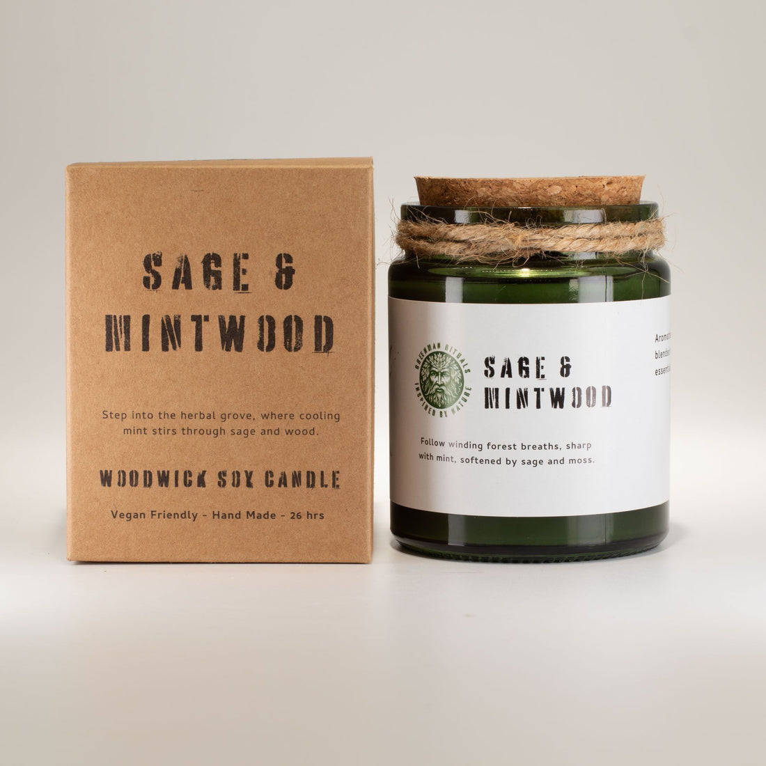 Sage and Mintwood candle with packaging on a light background