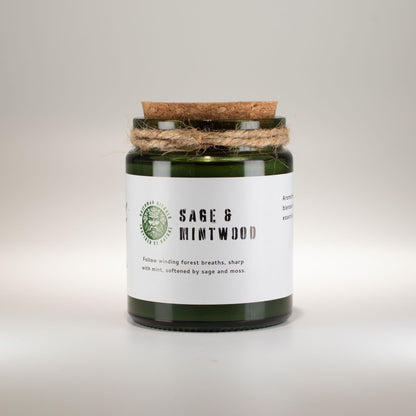 A scented candle jar labeled &