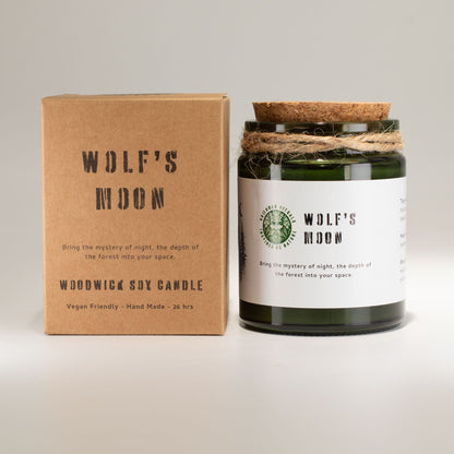 A wooden wick soy candle labeled &