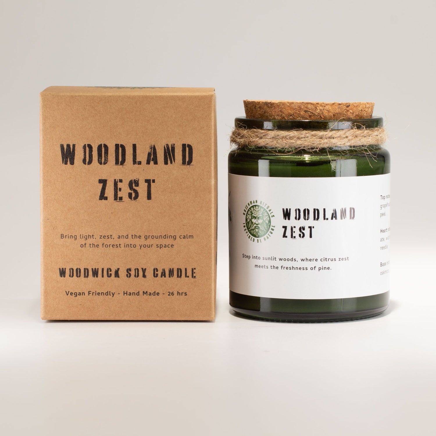 Woodland Zest candle and packaging on a light gray background