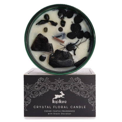 Crystal floral candle with black obsidian on a white background, featuring the brand &
