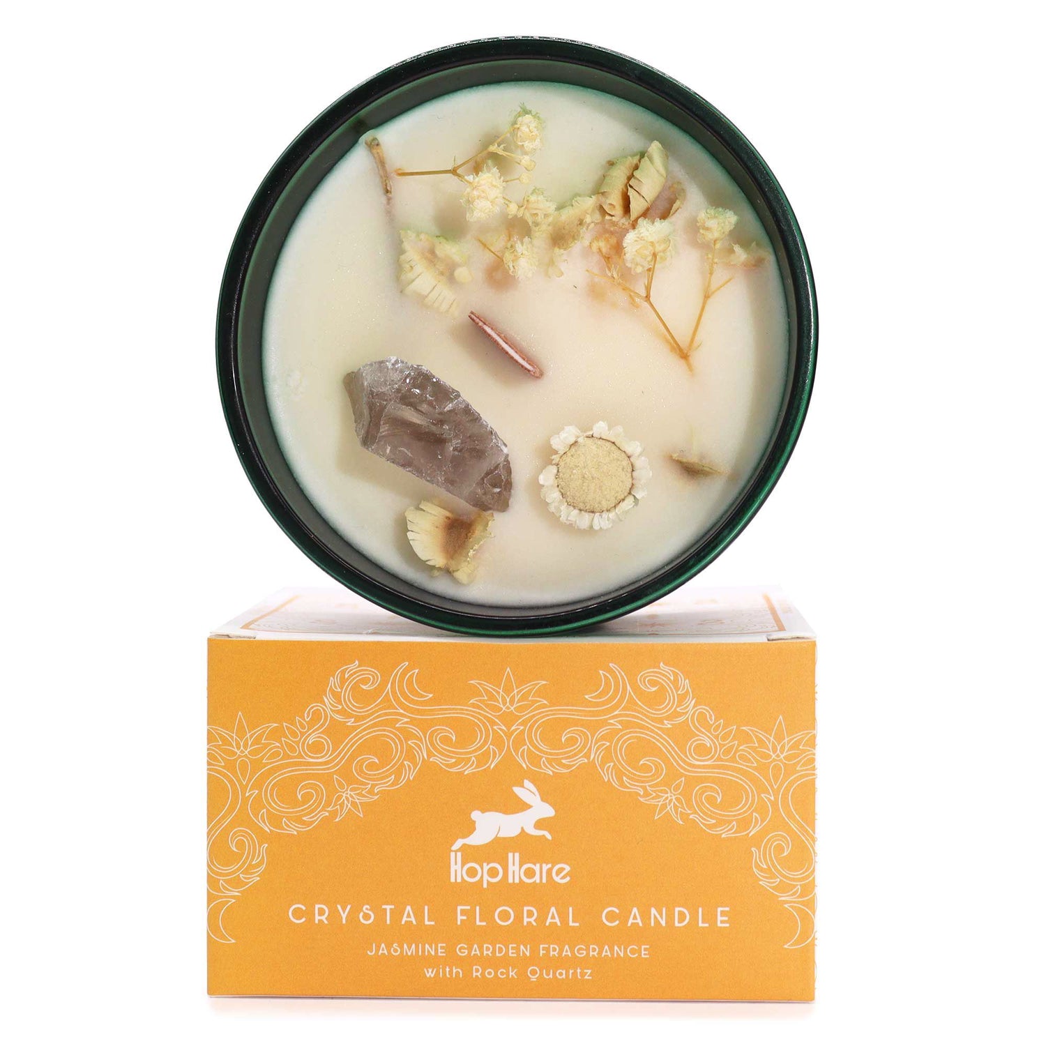 Crystal floral candle with decorative elements on a white background