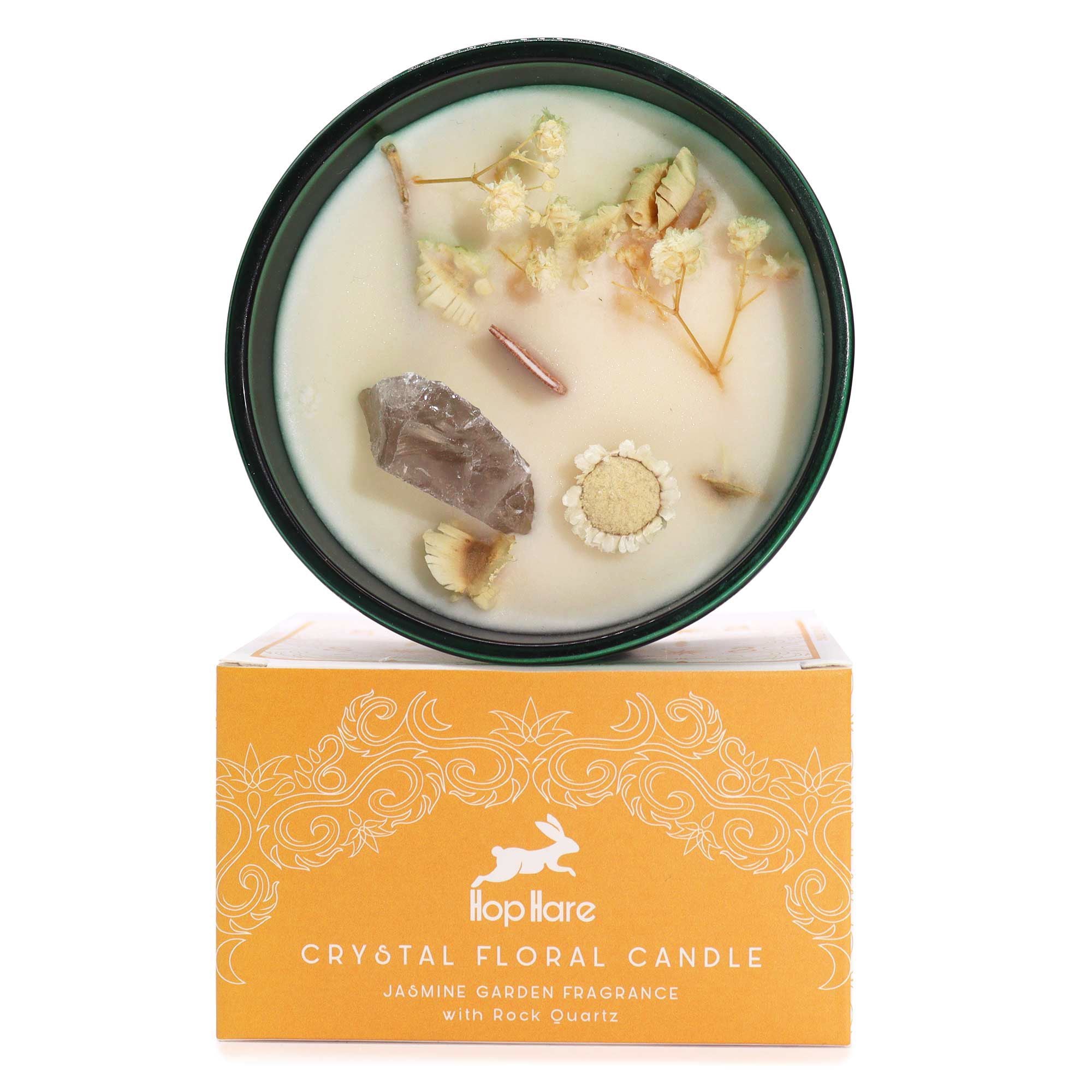 Crystal floral candle with decorative elements on a white background