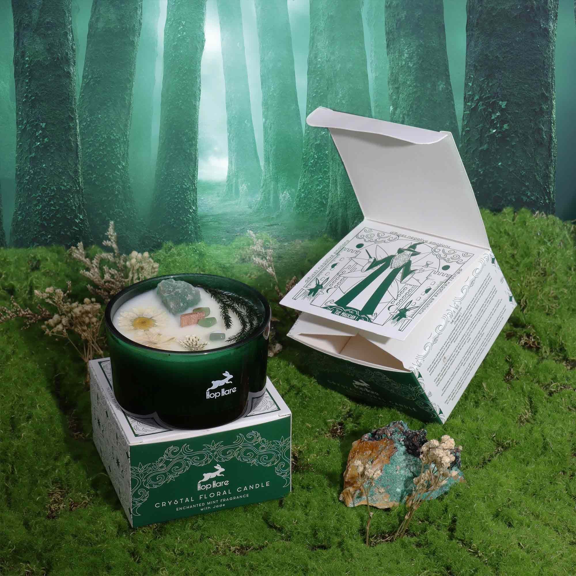 Candle with crystals in a forest setting