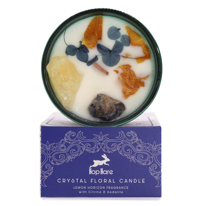 Crystal floral candle with decorative elements on a white background