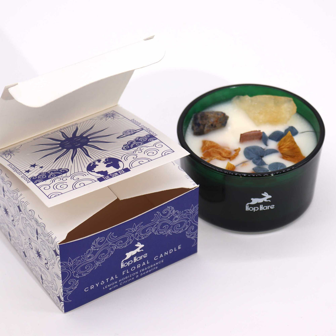Crystal floral candle and decorative box on a white background