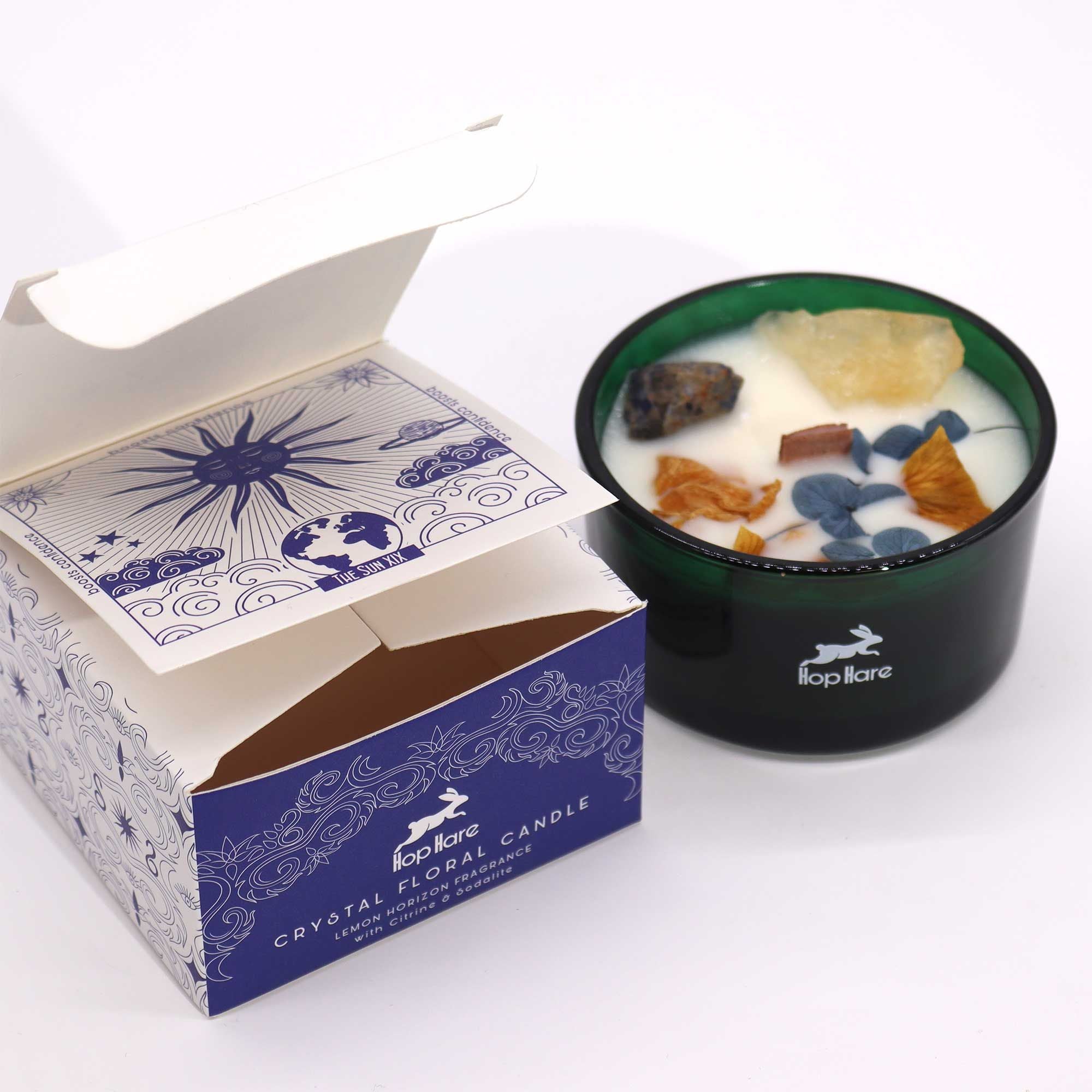 Crystal floral candle and decorative box on a white background