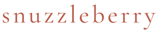 Terracotta text 'snuzzleberry' in a stylized font