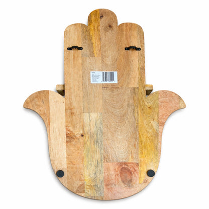Back of a wooden Hamsa-shaped shelf unit with a visible barcode label on a white background