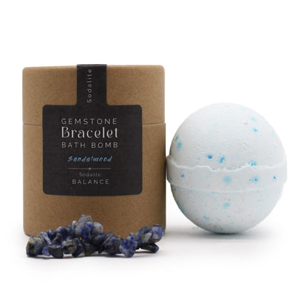 Gemstone Bracelet bath bomb with packaging and sodalite stones on a white background