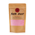 Bath Dust packaging with pink powder inside on a white background